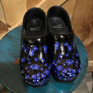 Dansko Black and Blue Floral Clogs